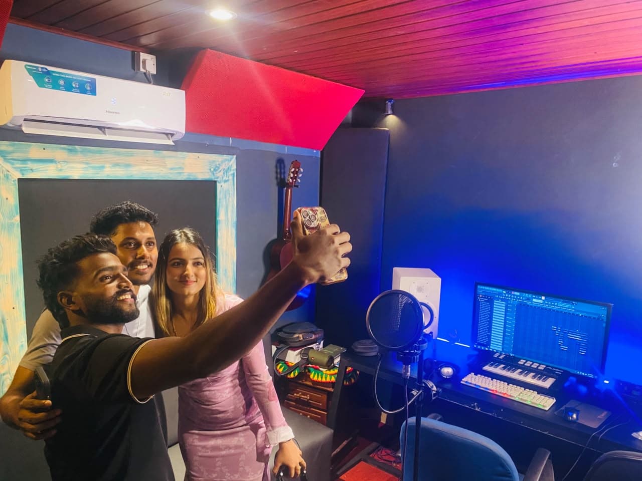 Artists capturing a moment together in the studio