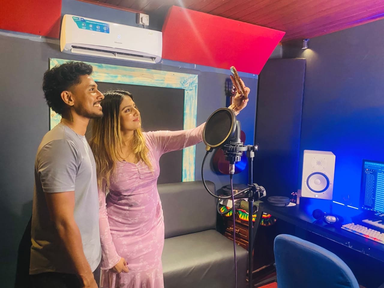 Artists collaborating during a vocal session